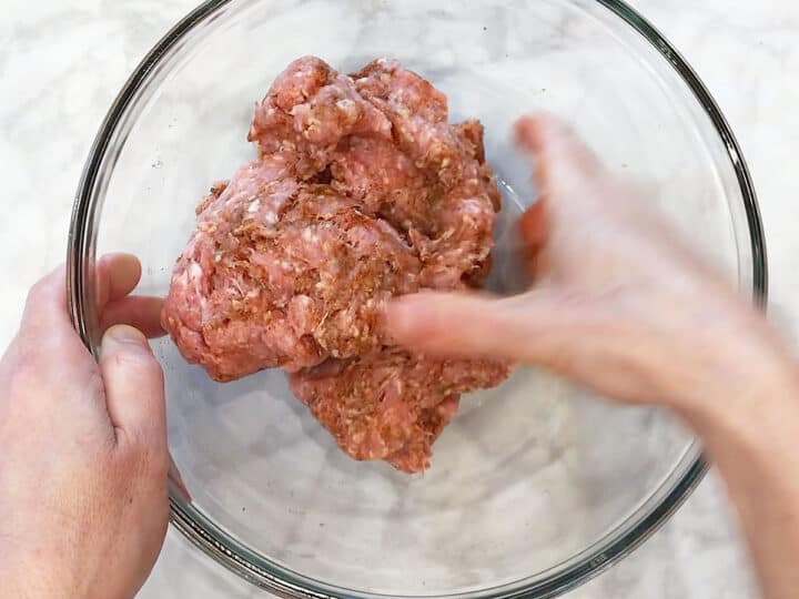 Mixing the sausage ingredients.