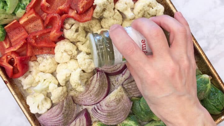 Seasoning the vegetables.