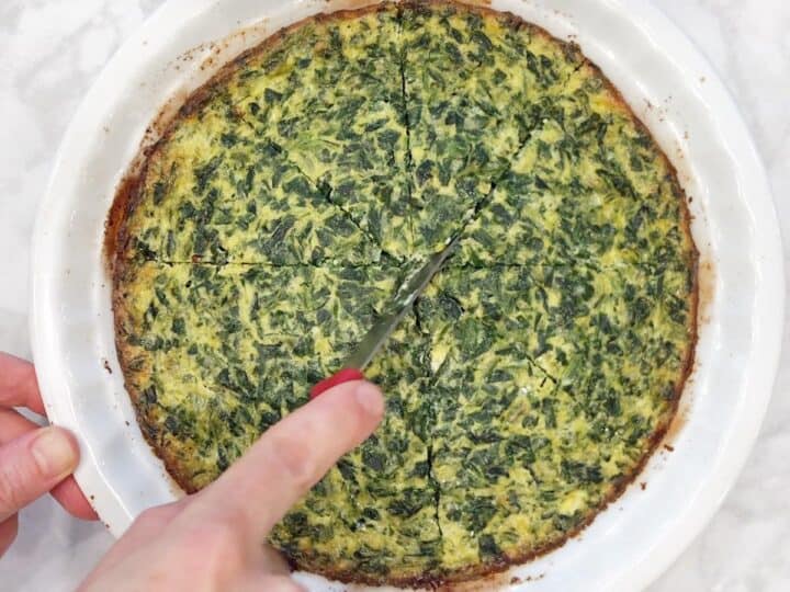 Slicing the quiche.