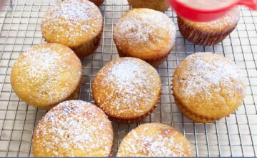 Dusting the muffins with a powdered sweetener.