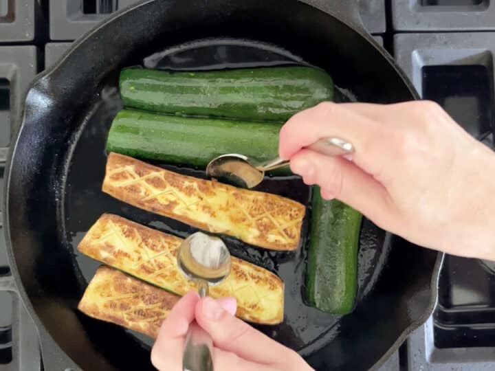 Flipping the zucchini.