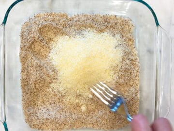 Mixing almond meal and parmesan.