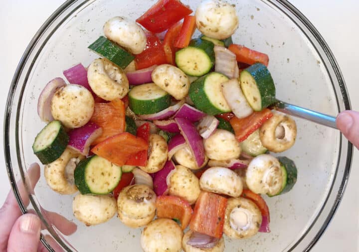 Mixing the veggies and the marinade.