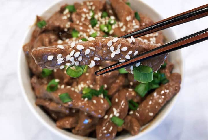 The dish is served with chopsticks.