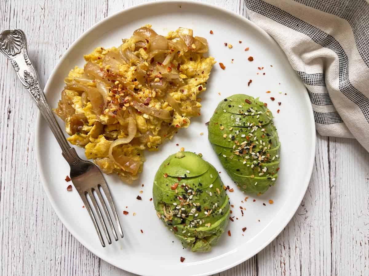 A scramble made with leftover onions and served with avocado.