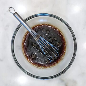 Mixing the sauce ingredients in a small bowl.