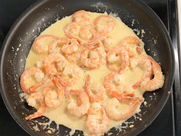 The shrimp were added back to the skillet.