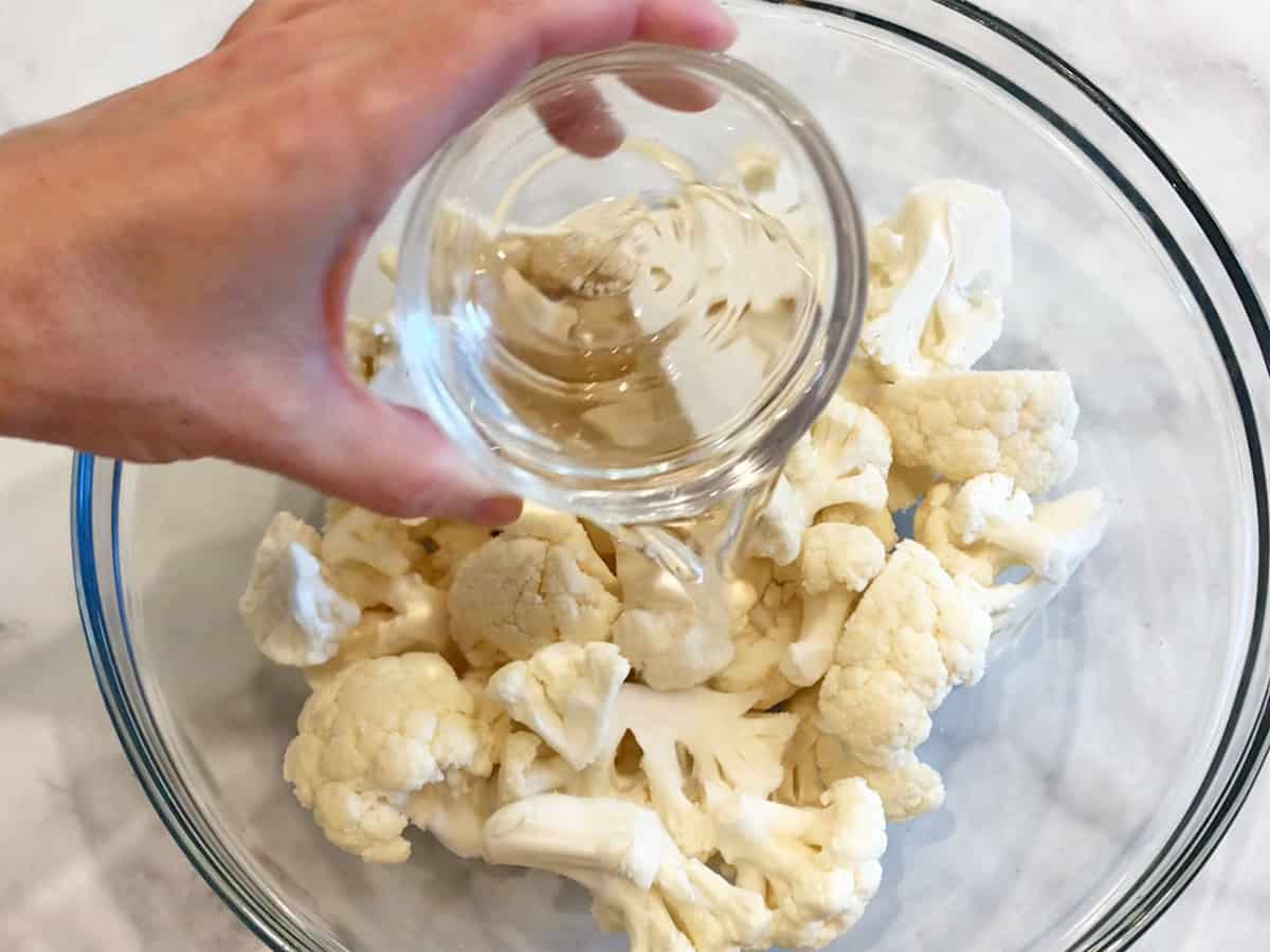 Adding water to the bowl.