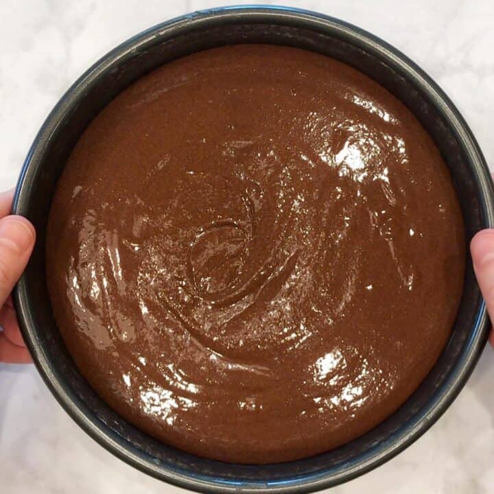 The cake batter is in the pan and ready for the oven.