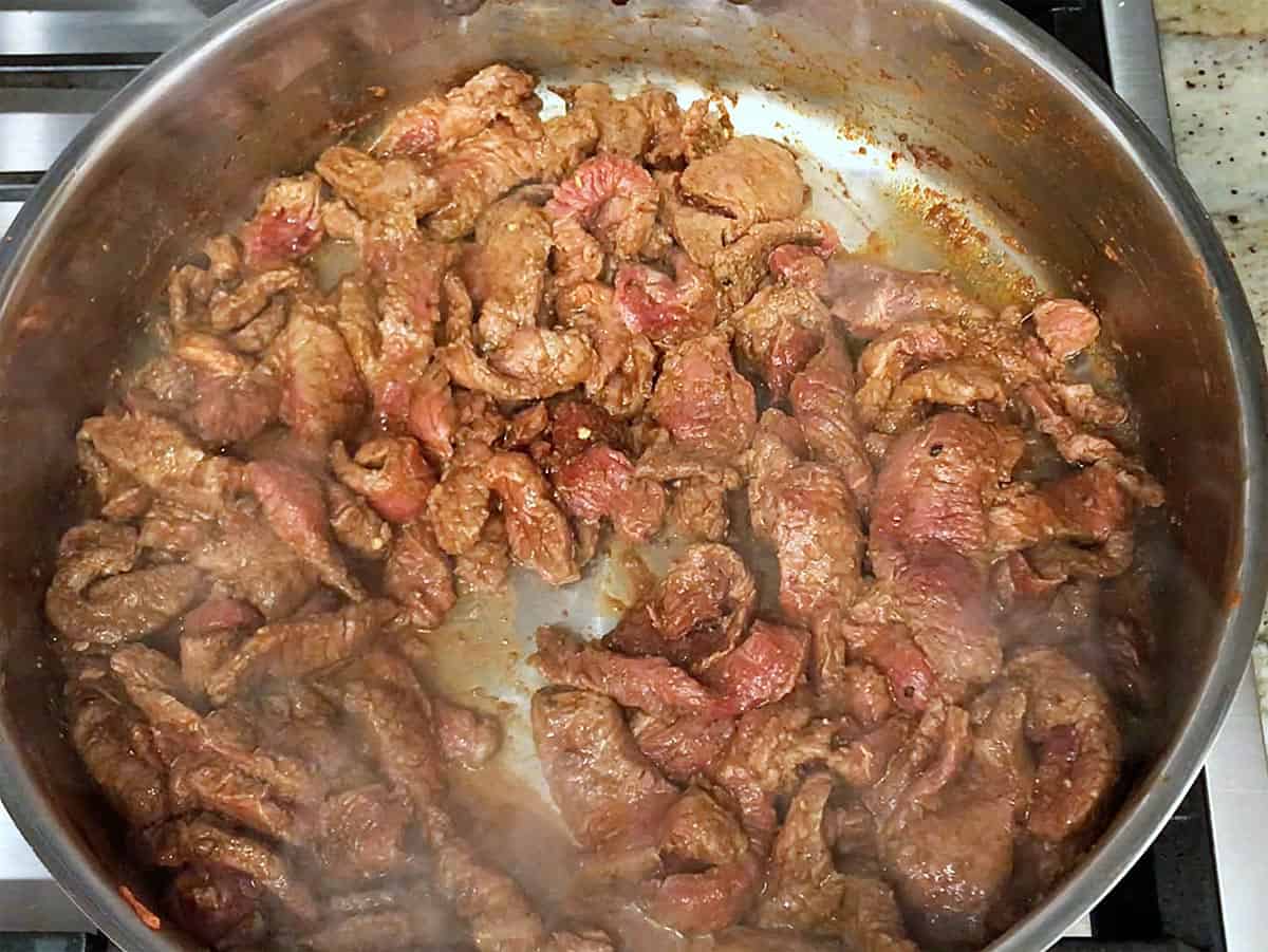 Cooking the beef.