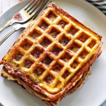 Chaffles are served on a white plate.