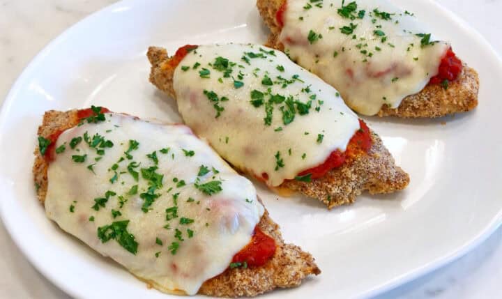 The chicken is served on a platter.