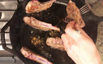 Cooking the fatty edges.