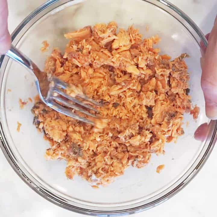 Flaking the salmon.