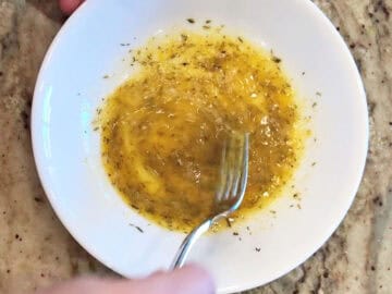 Mixing egg and spices.