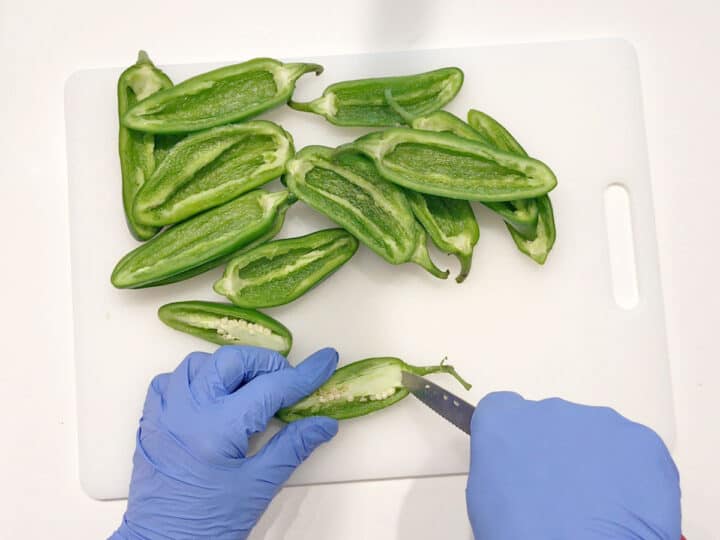 Prepping the jalapenos.