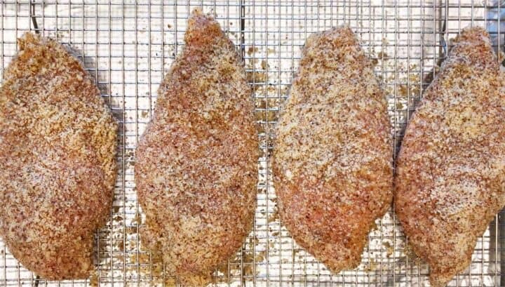 The chicken is ready for the oven.