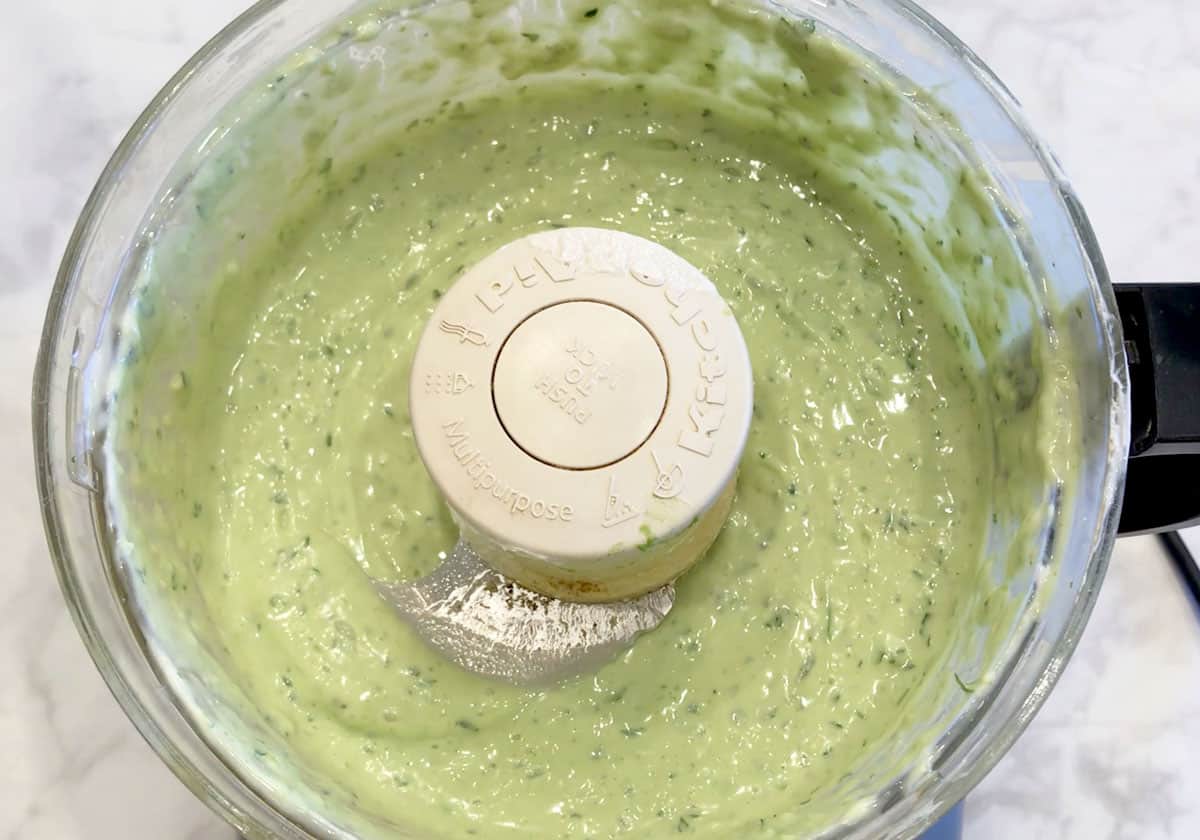 The soup is ready in the food processor.