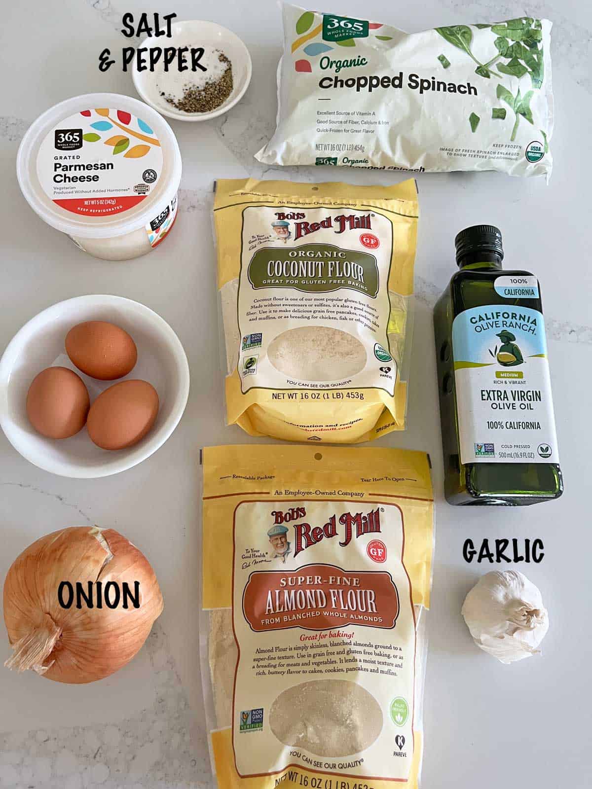 The ingredients needed to make spinach fritters.