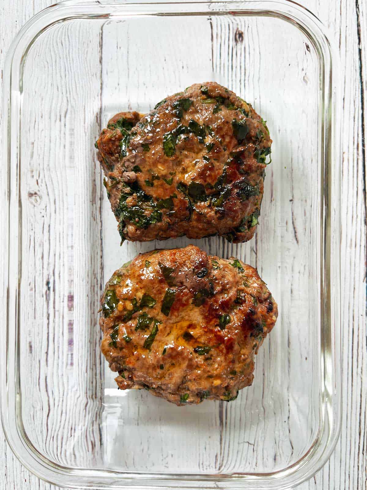 Storing leftover lamb burgers.