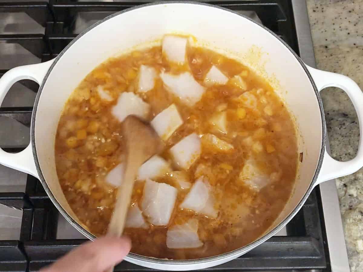 The fish pieces were added to the pot.