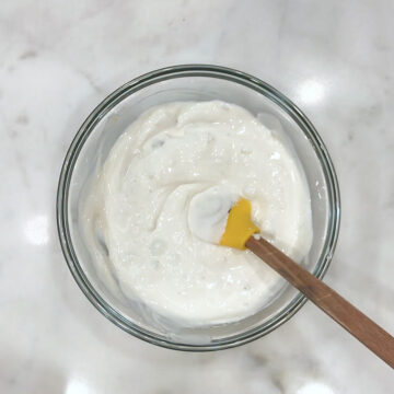 Mixing the blue cheese dressing.