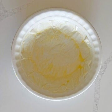 A parchment-lined pie plate.