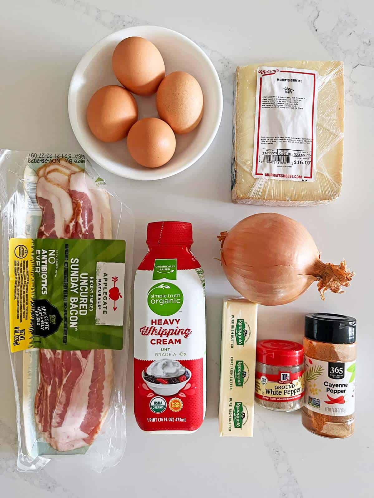 The ingredients needed to make a crustless quiche Lorraine.