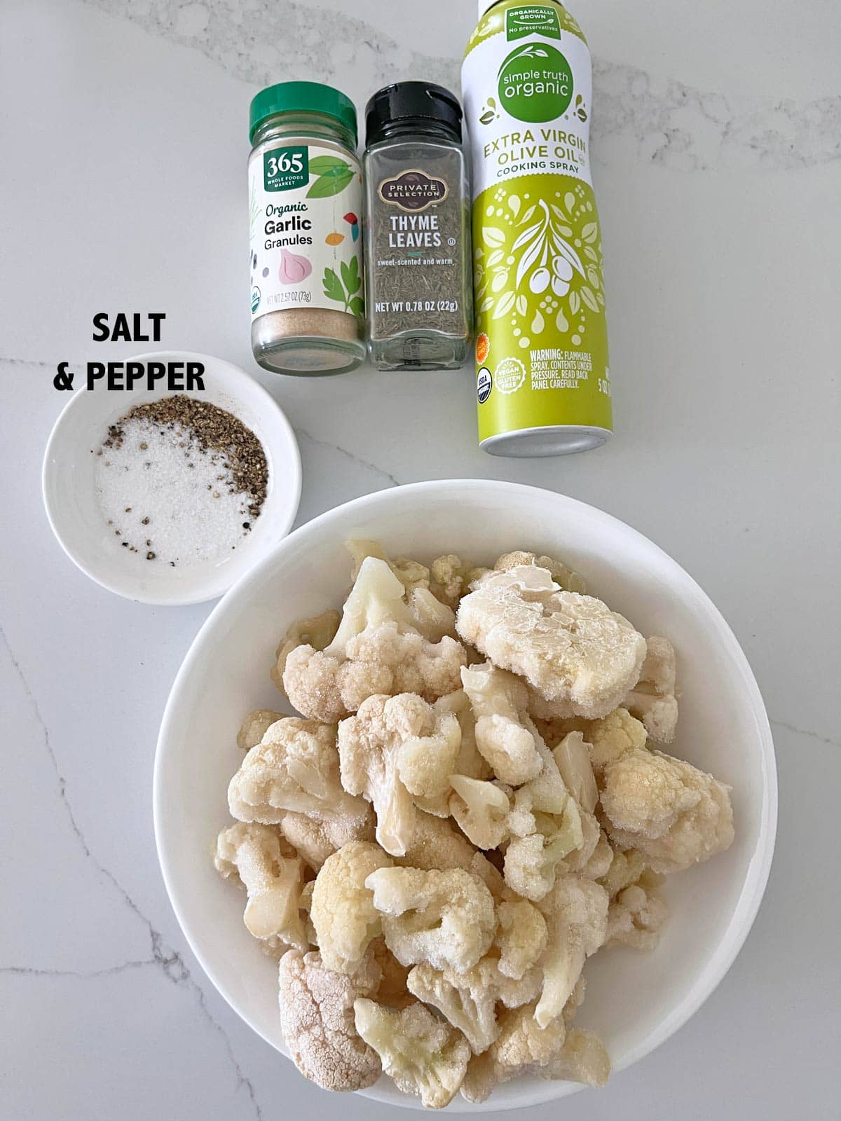 The ingredients needed to roast frozen cauliflower.