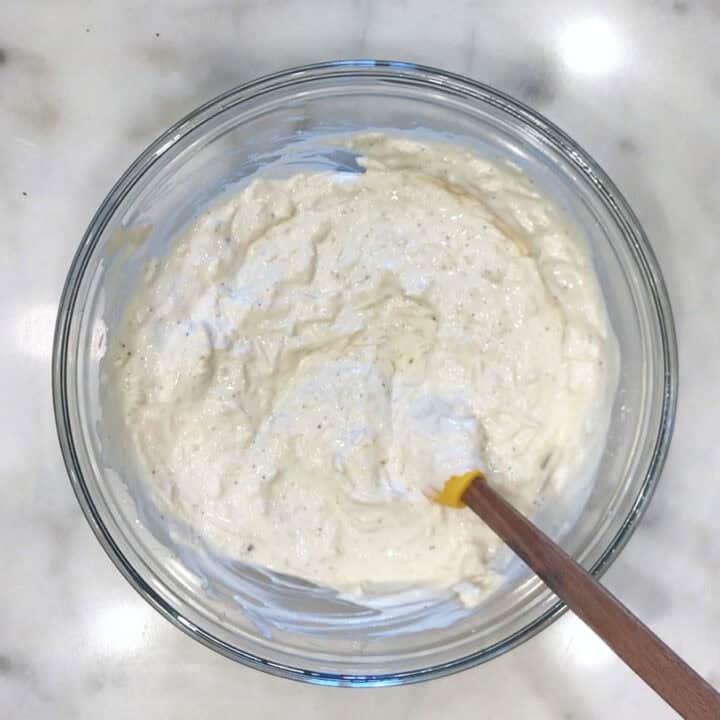Mixing the sauce for the casserole.