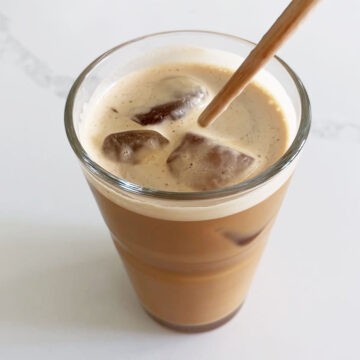 Stirring the coffee.