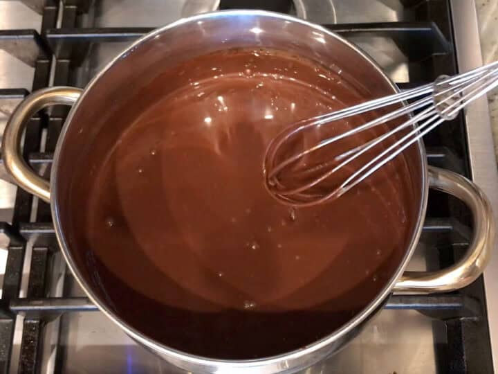 Whisking the pudding ingredients to combine.