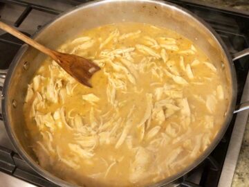 Cream and chicken were added to the pot.