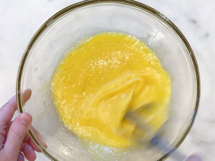 Mixing the liquid ingredients in a bowl.