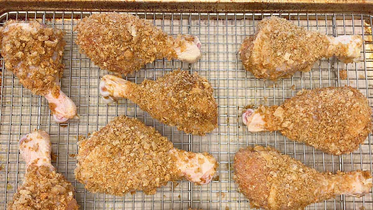 The coated chicken is on the pan and ready for the oven.