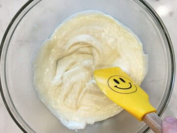 Melted cheeses in a bowl.