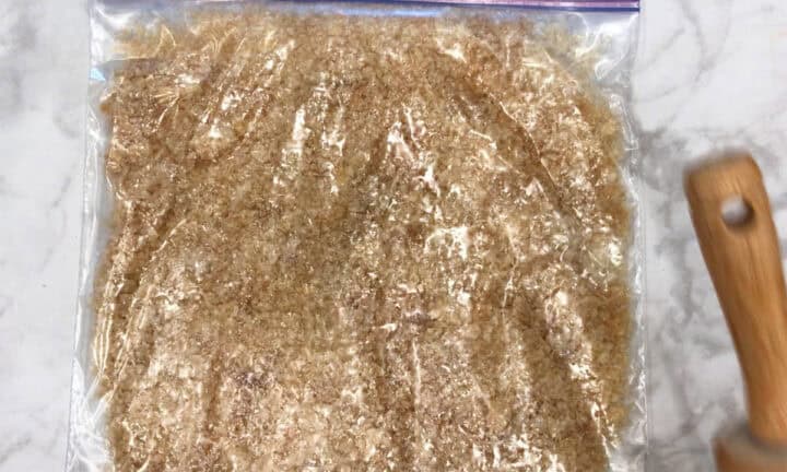 Crushed pork rinds in a resealable bag.