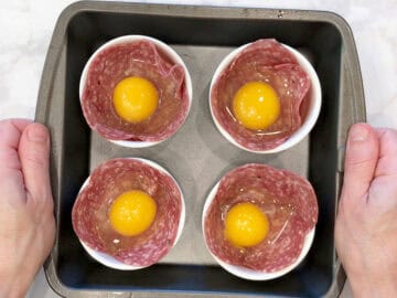 The eggs were added to the ramekins.