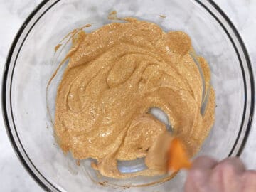 Mixing the yogurt coating.