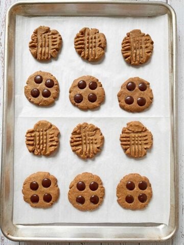 The cookies are fully baked in the pan.