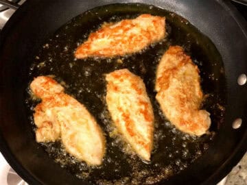 Frying the tenders in a skillet.