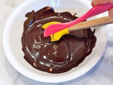 Adding stevia to the melted chocolate.