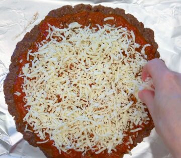 Adding the toppings.