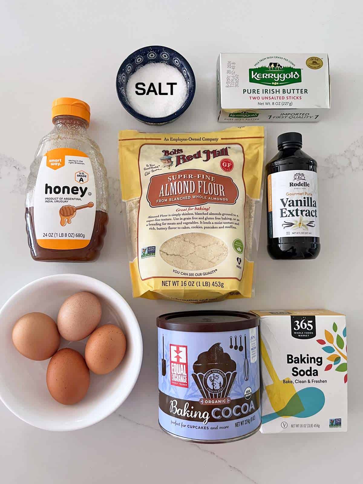 The ingredients needed to bake an almond flour chocolate cake.
