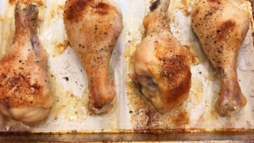 The chicken is fully baked in the pan.