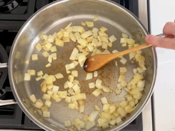 Sauteing the onions in butter.
