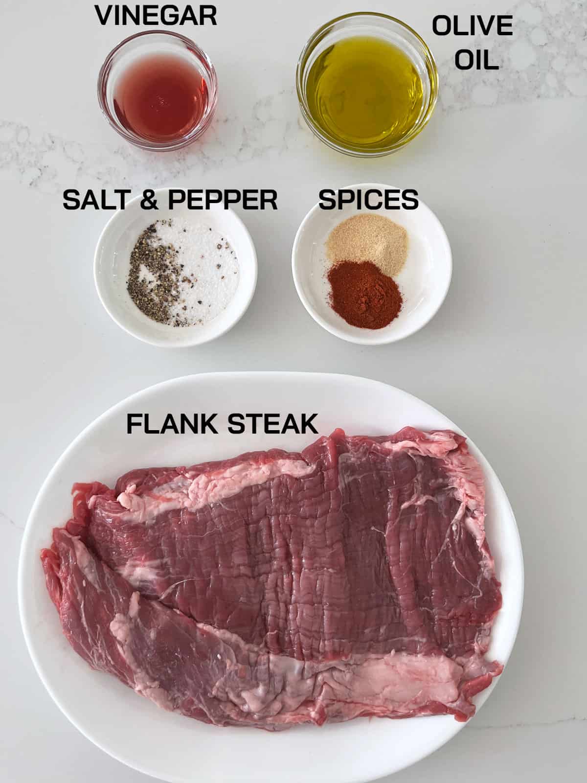 The ingredients needed to prepare a broiled flank steak.