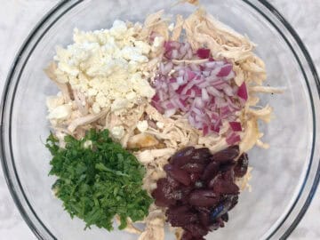 The salad ingredients in a bowl.