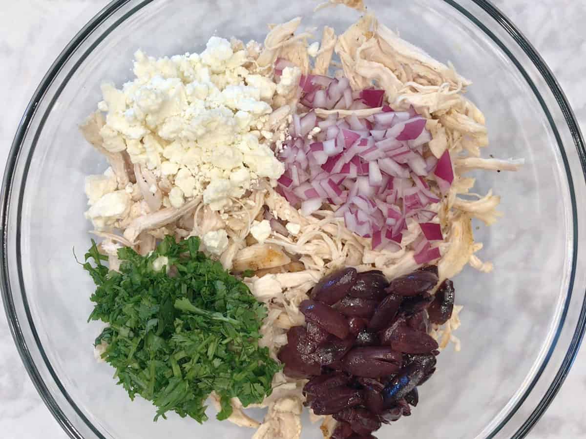 The salad ingredients in a bowl.