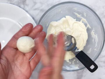 Shaping the mixture into balls.